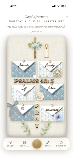 A Willow Chapel prayer board in a gold arched frame, holding labelled envelopes on soft linen