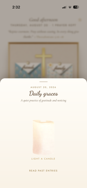 An evening candle glowing beside a short reflection in Willow Chapel